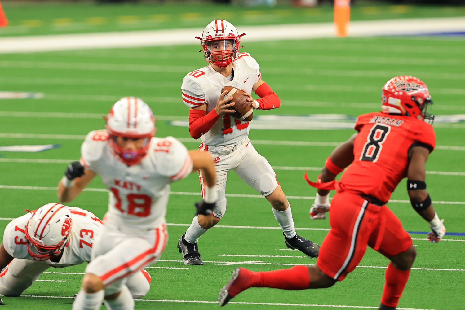 Katy High sophomore quarterback Caleb Koger (10) looks downfield during the Tigers’ 51-14 Class 6A-Division II state championship win over Cedar Hill on Saturday, Jan. 16, at AT&T Stadium in Arlington.