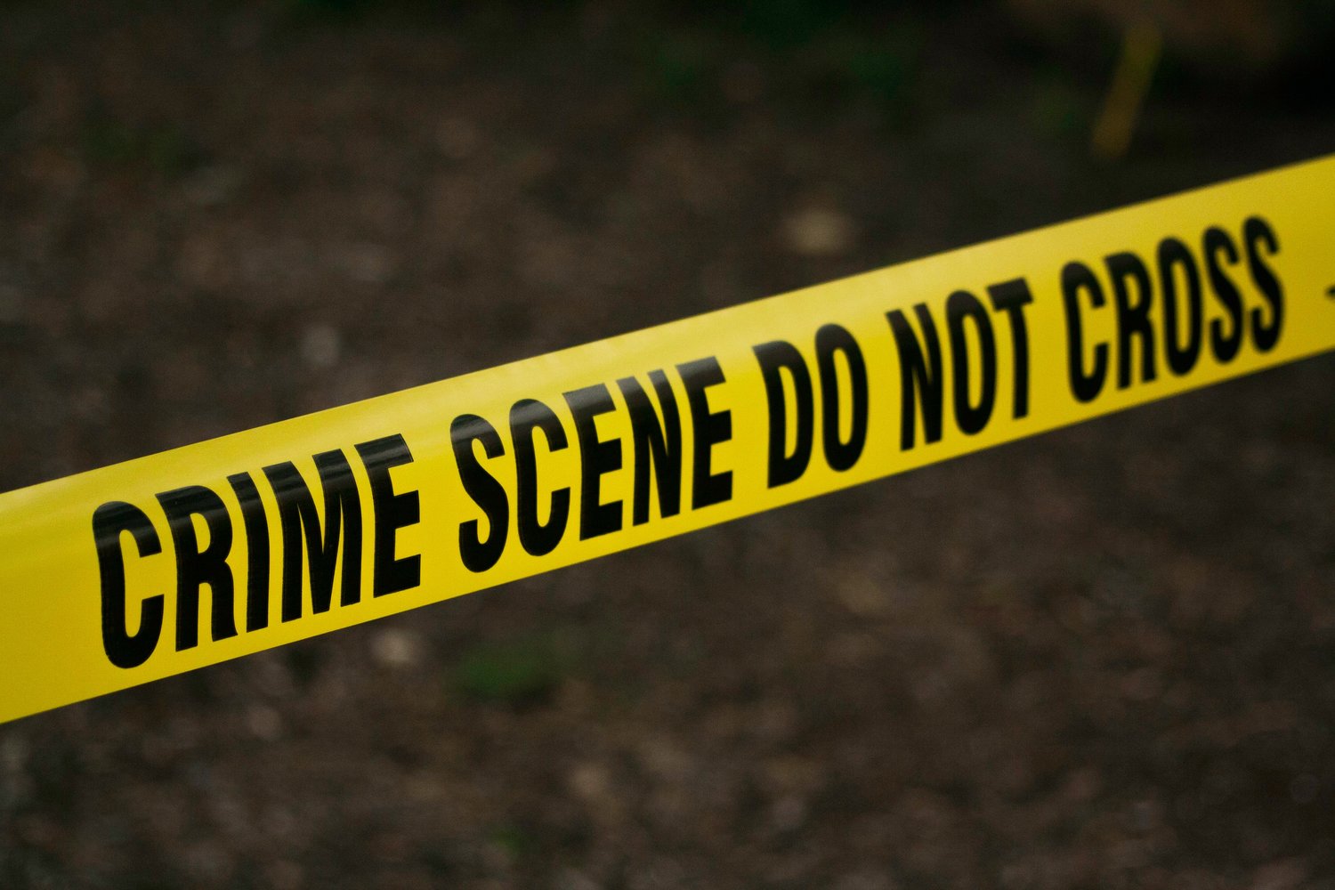 A man has died and his son has been injured after an unknown assailant or assailants fired into his apartment, striking him three times and his five-year-old son once.