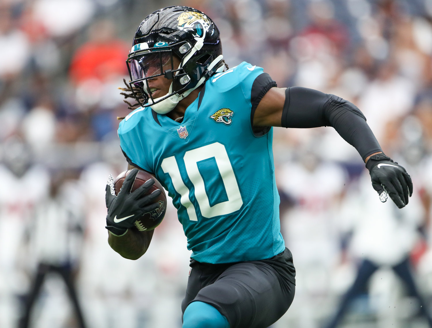 Jacksonville Jaguars wide receiver Laviska Shenault Jr. (10) carries the ball during the first half of an NFL game between the Houston Texans and the Jacksonville Jaguars on September 12, 2021 in Houston, Texas.