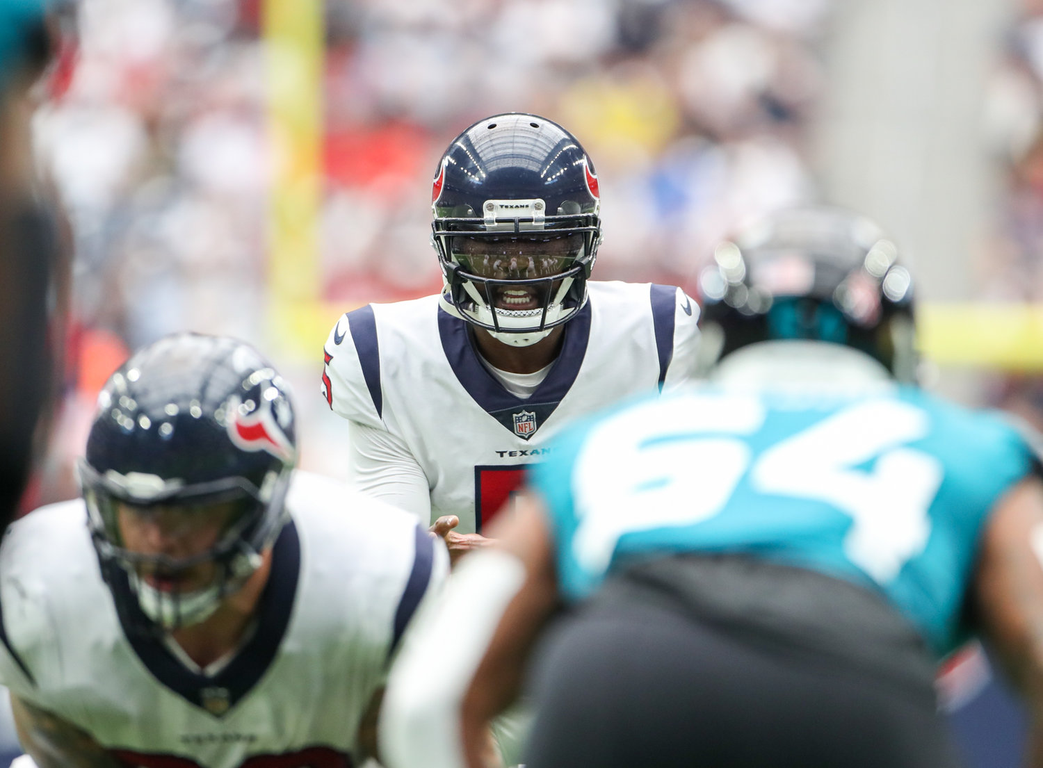 Houston Texans quarterback Tyrod Taylor (5) at the line of scrimmage during the first half of an NFL game between the Houston Texans and the Jacksonville Jaguars on September 12, 2021 in Houston, Texas.