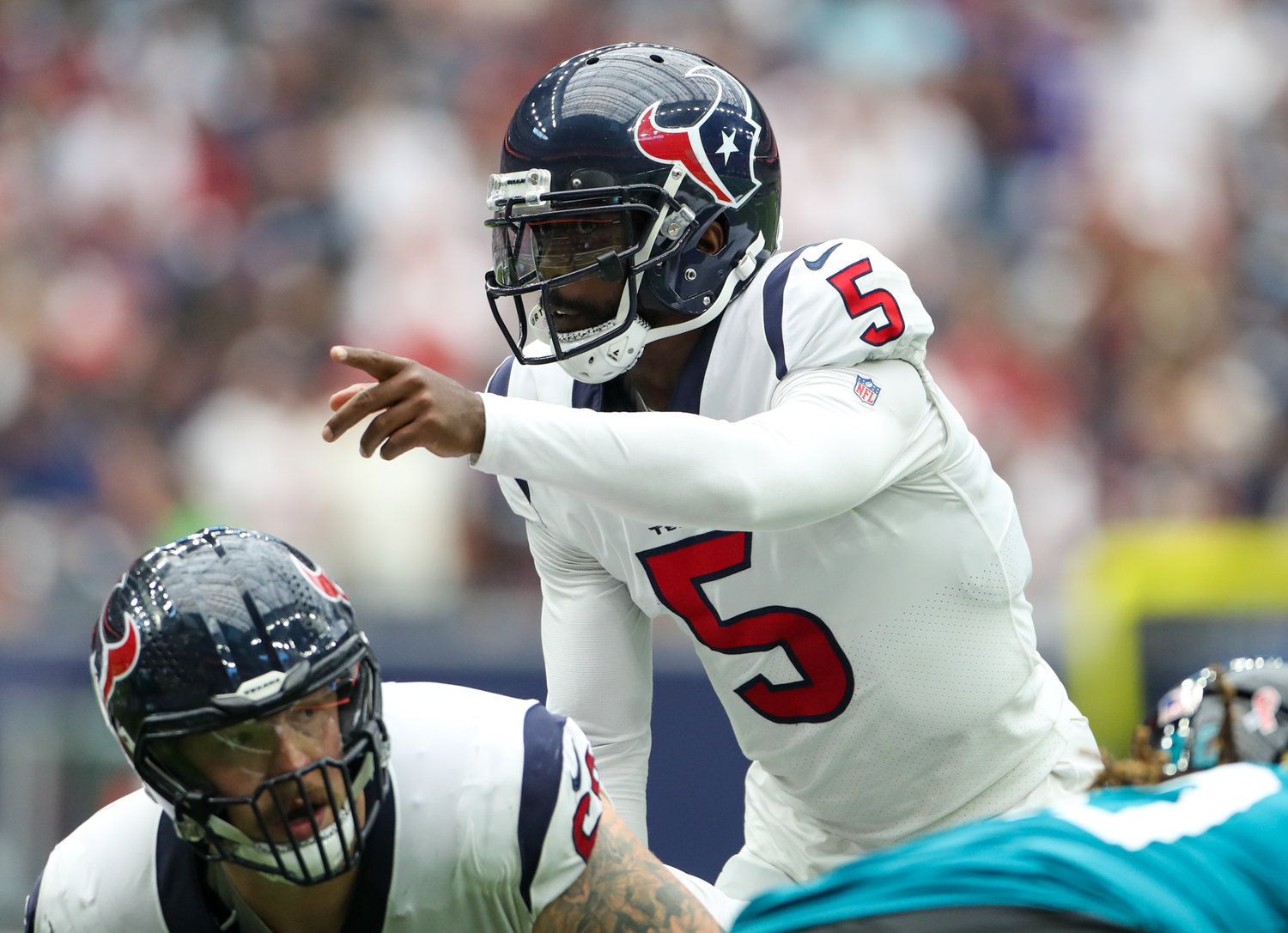 Houston Texans quarterback Tyrod Taylor (5) gestures before a snap during the first half of an NFL game between the Houston Texans and the Jacksonville Jaguars on September 12, 2021 in Houston, Texas.