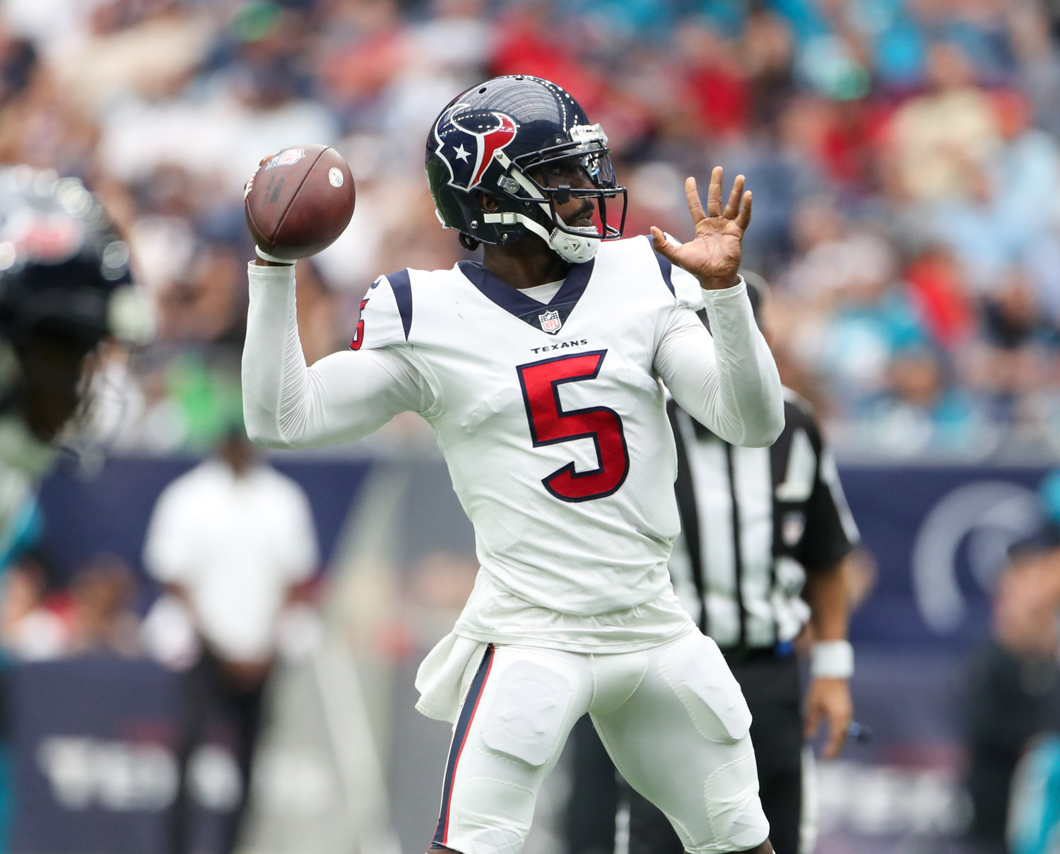 Houston Texans quarterback Tyrod Taylor (5) looks to pass during the first half of an NFL game between the Houston Texans and the Jacksonville Jaguars on September 12, 2021 in Houston, Texas.