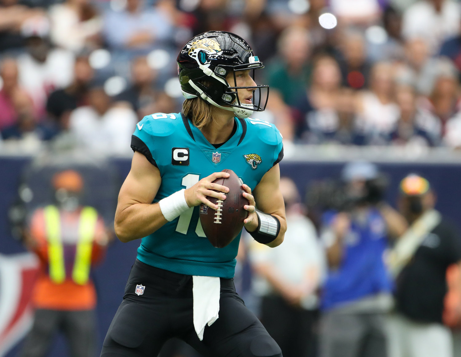 Jacksonville Jaguars quarterback Trevor Lawrence (16) looks to pass during the first half of an NFL game between the Houston Texans and the Jacksonville Jaguars on September 12, 2021 in Houston, Texas.