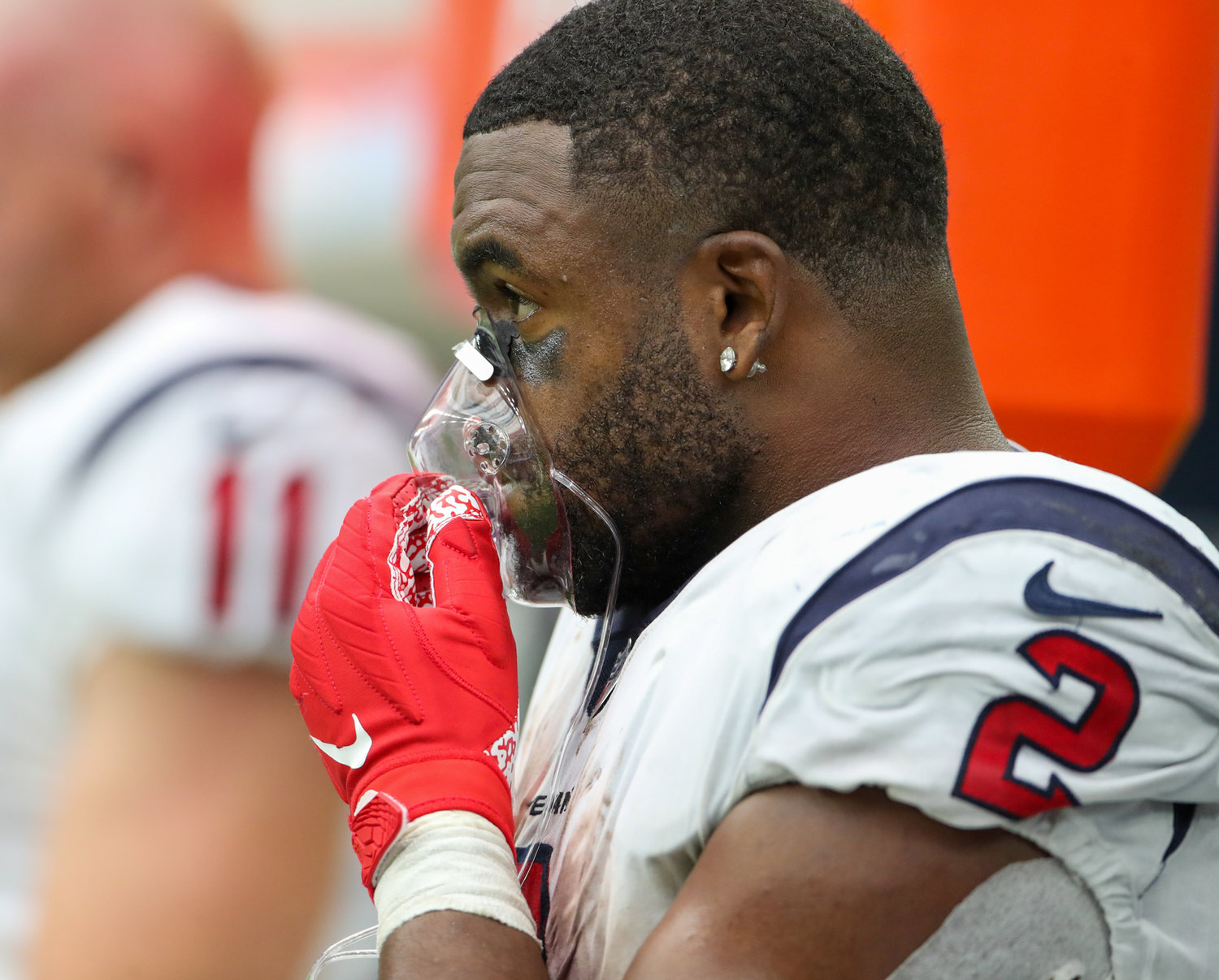 Houston Texans running back Mark Ingram (2) gets oxygen on the sideline during the second half of an NFL game between the Houston Texans and the Jacksonville Jaguars on September 12, 2021 in Houston, Texas.