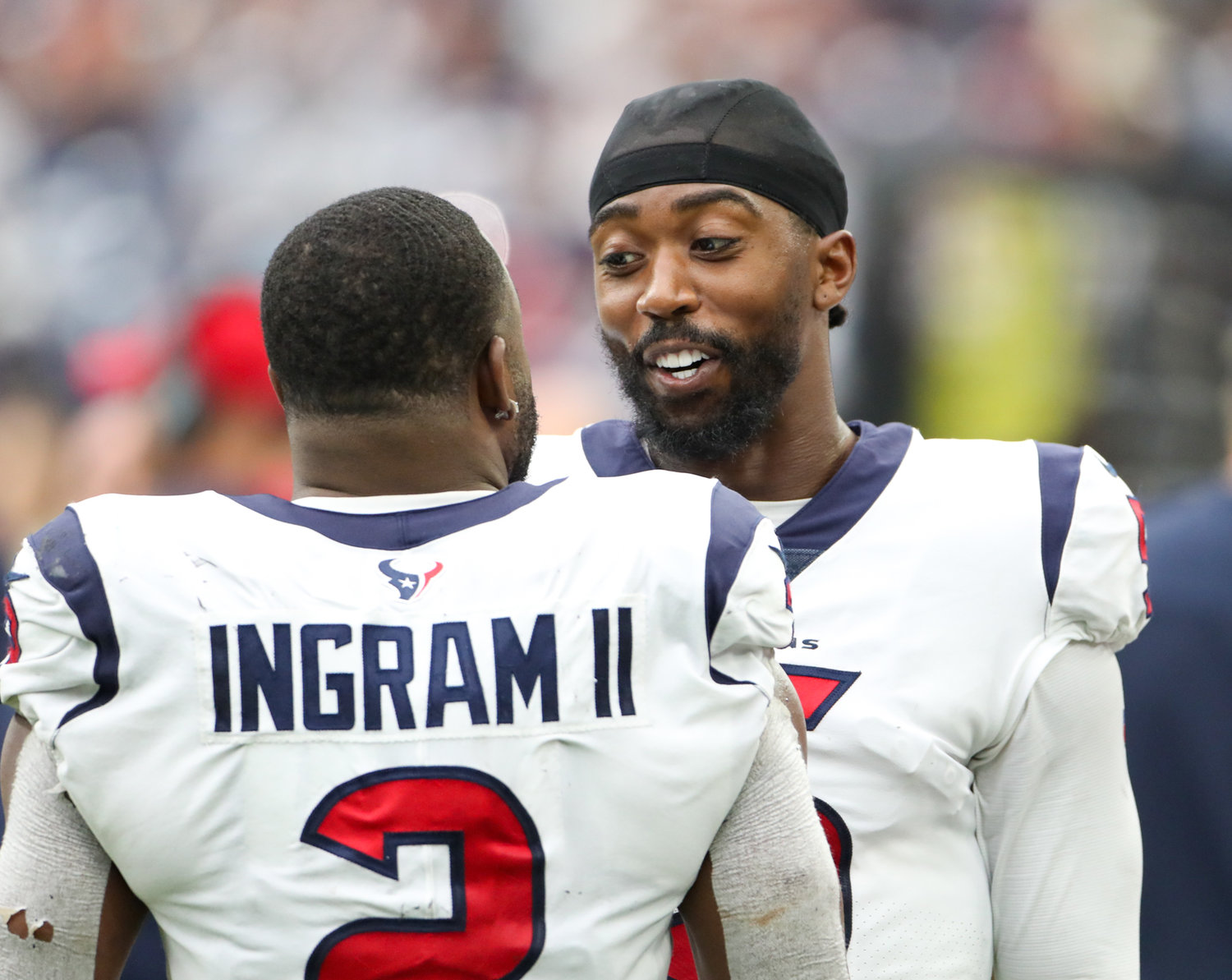 Houston Texans running back Mark Ingram (2) talks with quarterback Tyrod Taylor (5) on the sideline during the second half of an NFL game between the Houston Texans and the Jacksonville Jaguars on September 12, 2021 in Houston, Texas.