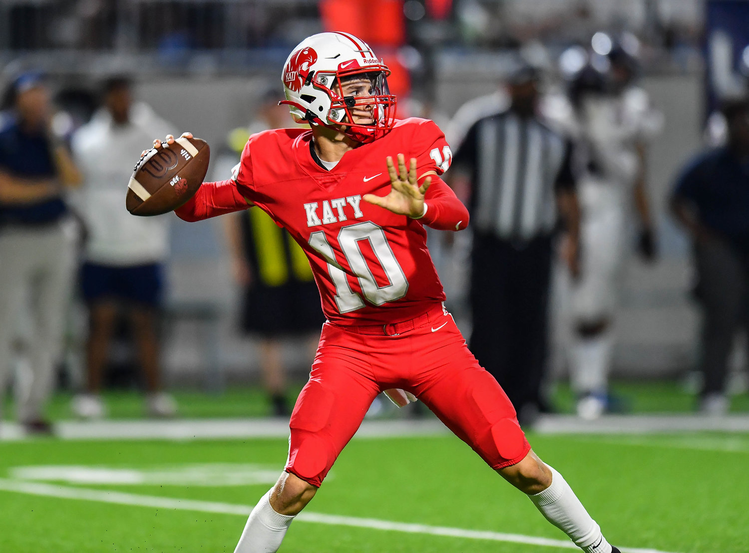 Katy, Tx. Oct. 1, 2021: Katy's #10 Caleb Koger delivers a pass for a TD during a game between Katy Tigers and Tompkins Falcons at Legacy Stadium in Katy. (Photo by Mark Goodman / Katy Times)