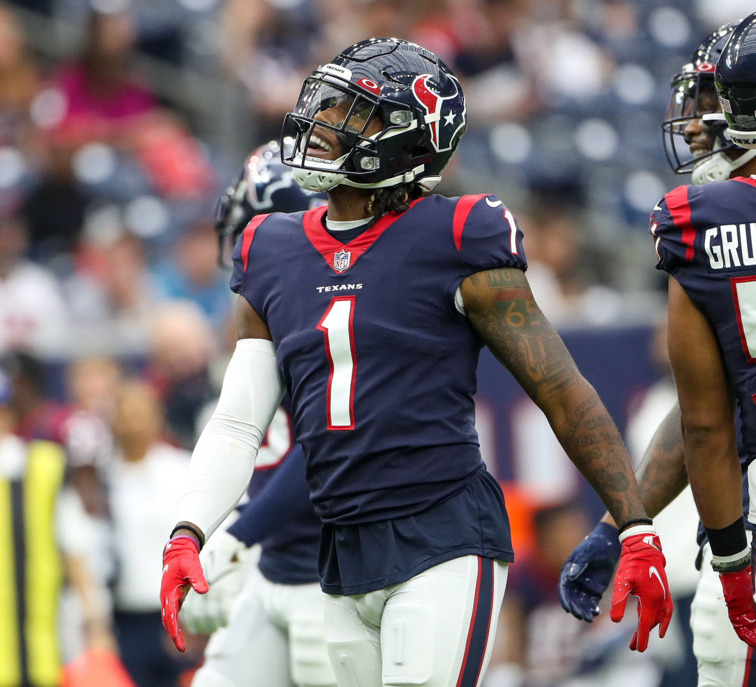 Houston Texans safety Lonnie Johnson (1) reacts after being flagged for unnecessary roughness on a tackle during an NFL game between Houston and New England on October 10, 2021 in Houston, Texas. The Patriots won 25-22.