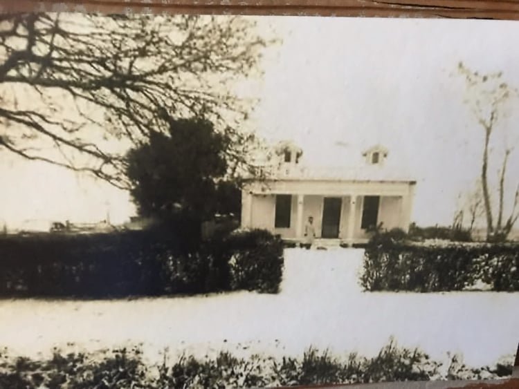 The Fussel home many years ago was surrounded by a hedge and had a less finished porch. Generations of the Fussel family grew up in the home which has seen much of Katy's growth over the last century.