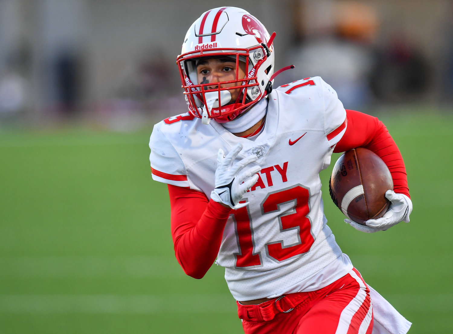 Katy, Tx. Nov 5, 2021: Katy's #13 Ronnie Schneider carries the ball during a conference game between Katy and Morton Ranch at Legacy Stadium in Katy. (Photo by Mark Goodman / Katy Times)