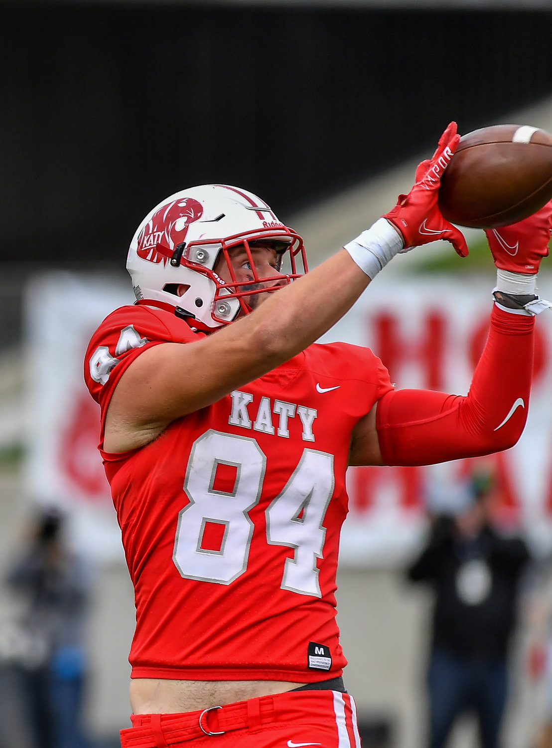 Katy Tx. Nov 26, 2021:  Katy's #84 Luke Carter makes the reception in the end zone for a TD during the UIL regional playoff game between Katy Tigers and King Panthers at Legacy Stadium in Katy. (Photo by Mark Goodman / Katy Times)