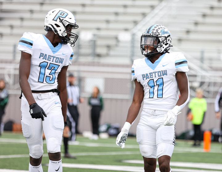 Paetow Panthers junior wide receiver Justin Stevenson (13) and senior wide receiver Kole Wilson (11) celebrate after a touchdown during a high school football playoff game between Cedar Park and Paetow on November 26, 2021 in Waller, Texas.
