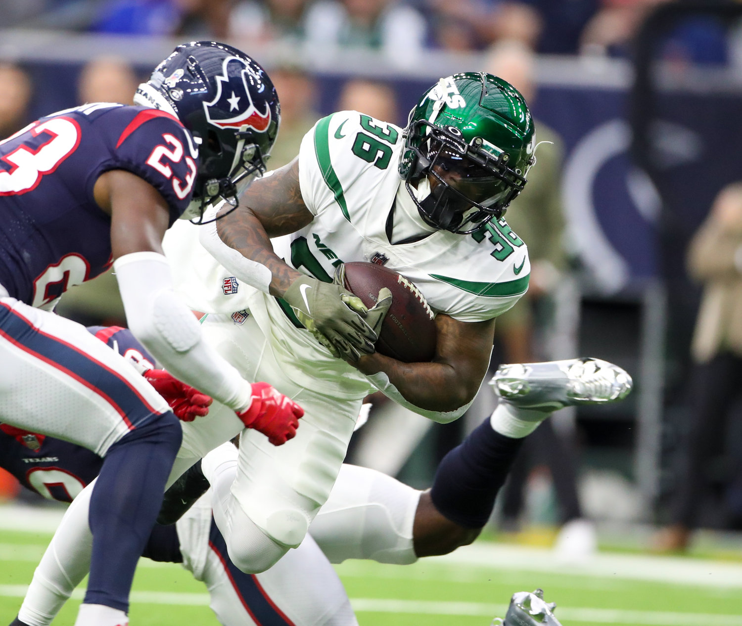 New York Jets running back Austin Walter (36) carries the ball during an NFL game between the Houston Texans and the New York Jets on November 28, 2021 in Houston, Texas. The Jets won, 21-14