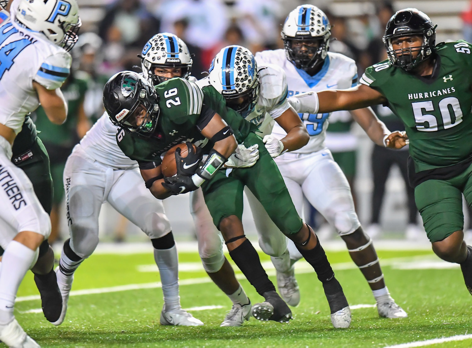 Houston, Tx. Dec 3, 2021: Paetows defense stops Hightowers running game during the quarterfinal playoff game between Paetow and F,B. Hightower at Rice Stadium in Houston. (Photo by Mark Gooman / Katy Times)