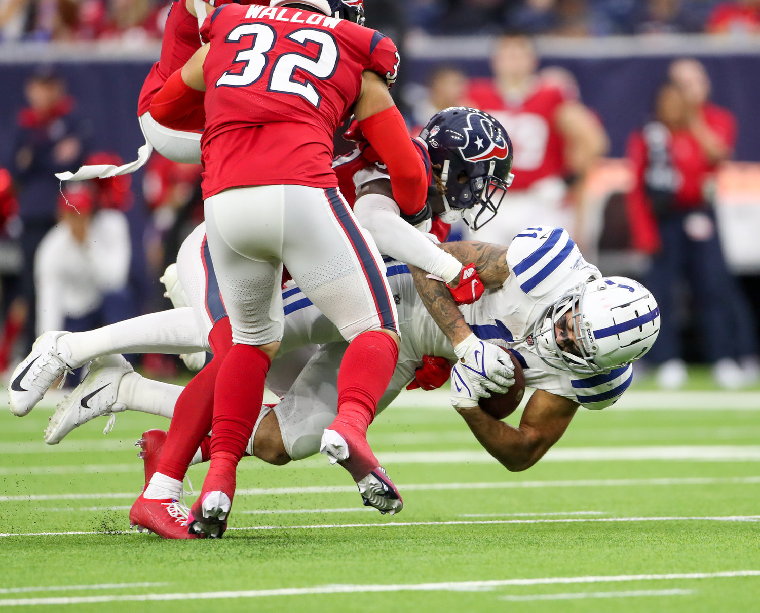 Indianapolis Colts wide receiver Michael Pittman Jr. (11) is tackled after a reception during an NFL game between the Texans and the Colts on December 5, 2021 in Houston, Texas. The Colts won, 31-0.