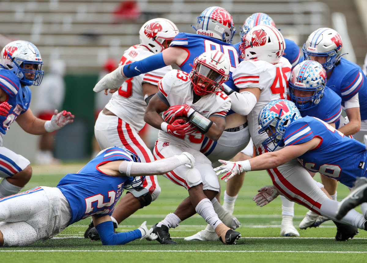 Katy Tigers running back Seth Davis (23) is bottled up in the backfield during the Class 6A Division II state semifinal  game between Katy and Westlake on December 11, 2021 in Waco, Texas.