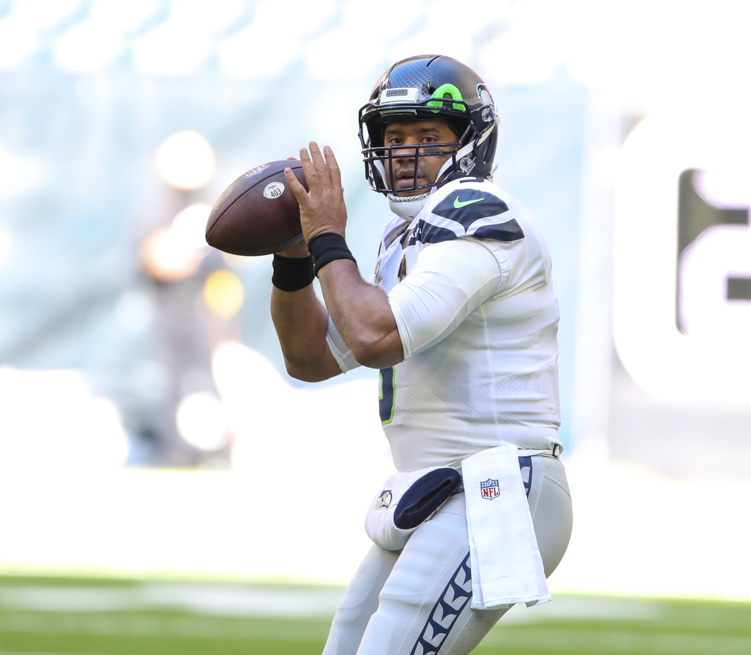 Seattle Seahawks quarterback Russell Wilson (3) warms up before the start of an NFL game between the Seahawks and the Texans on December 12, 2021 in Houston, Texas.