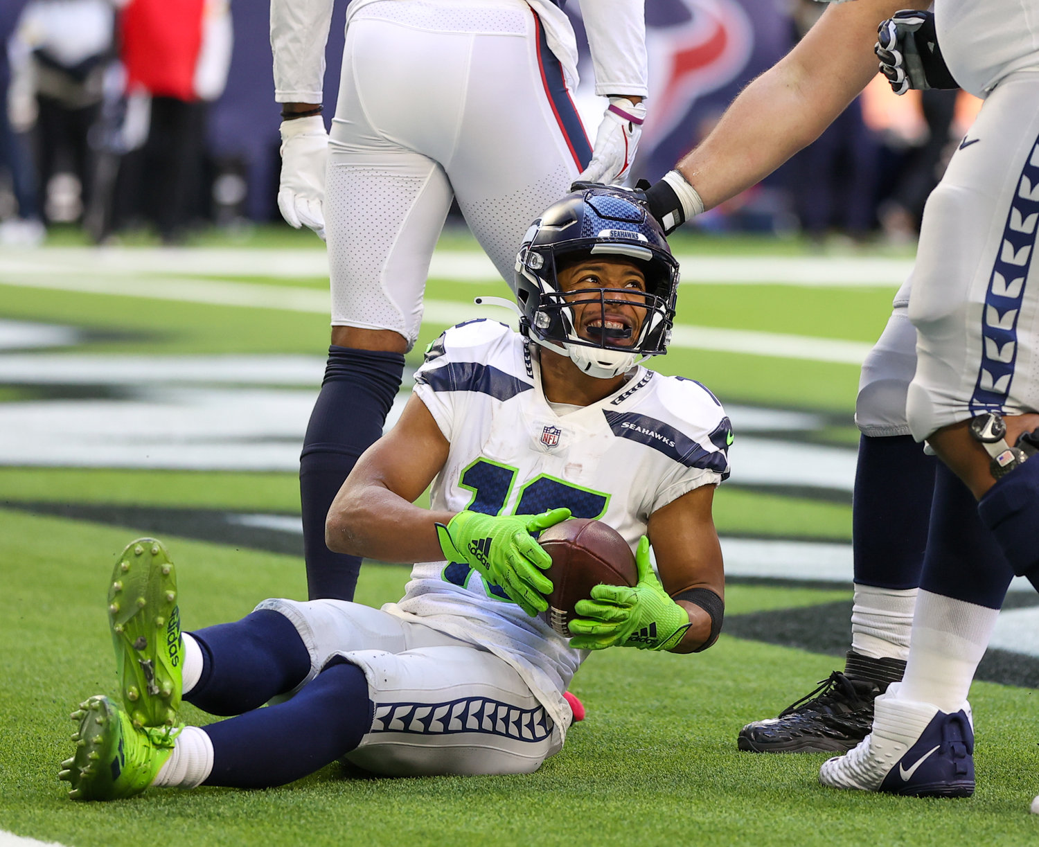 Seattle Seahawks wide receiver Tyler Lockett (16) reacts after catching a pass for a successful two-point conversion during the second half of an NFL game between the Seahawks and the Texans on December 12, 2021 in Houston, Texas.