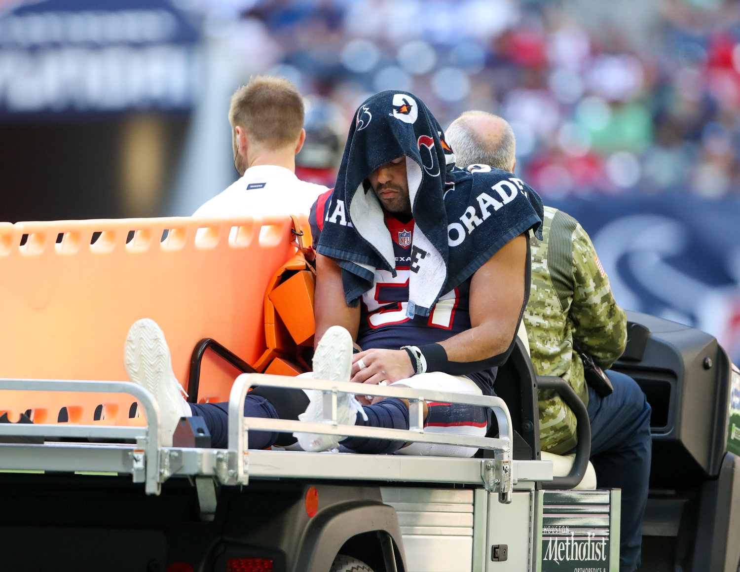 Houston Texans linebacker Kamu Grugier-Hill (51) is carted off the field after sustaining an injury during the second half of an NFL game between the Seahawks and the Texans on December 12, 2021 in Houston, Texas.