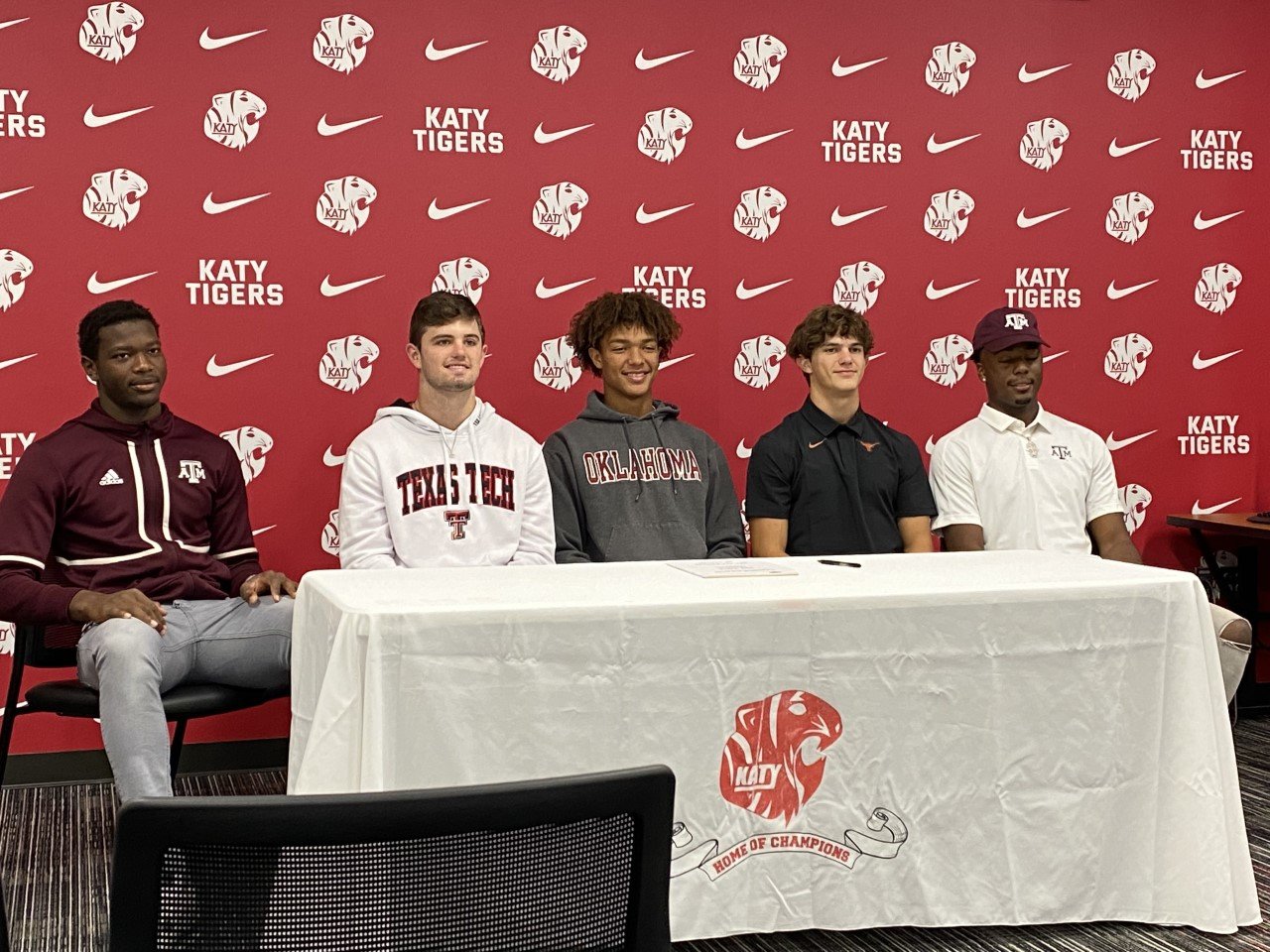 Malick Sylla, Ty Kana, Nic Anderson, Hamilton McMartin and Bobby Taylor wait to sign their national letters of intent on Wednesday.