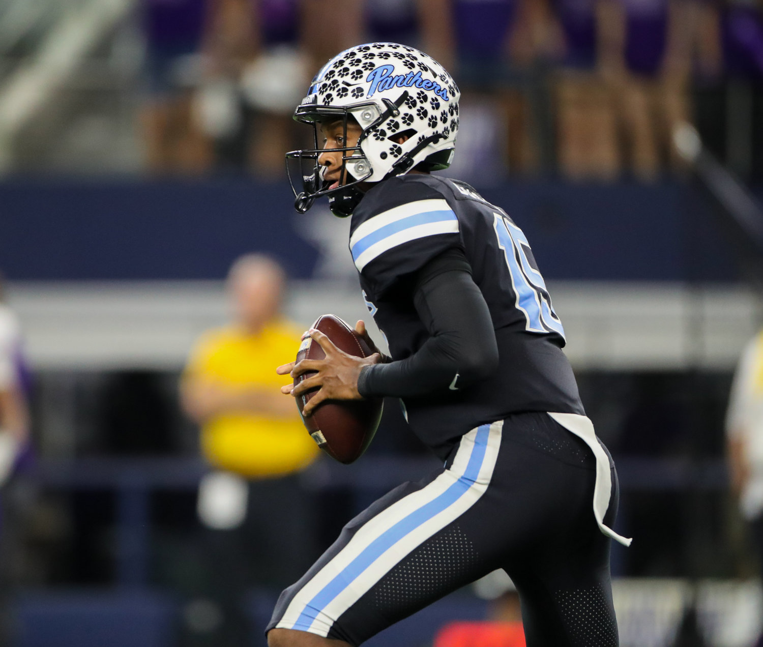 Paetow Panthers quarterback C.J. Dumas Jr. (15) looks to pass during the Class 5A Division I state football championship game between Paetow and College Station on December 17, 2021 in Arlington, Texas.