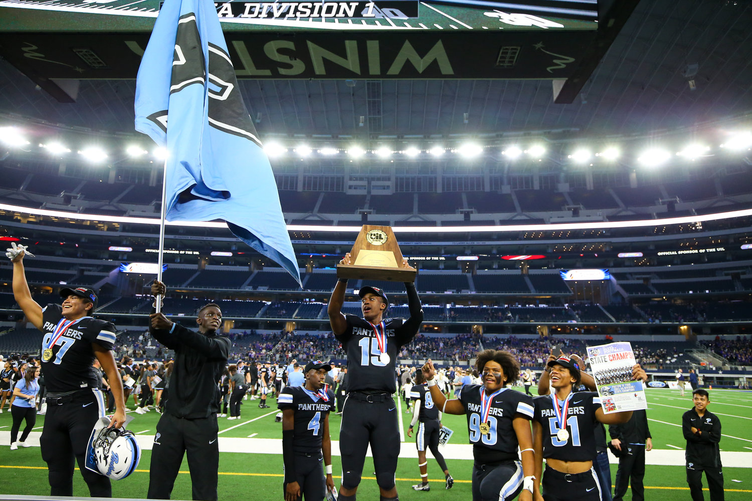 Paetow Panthers players celebrate a 27-24 win over College Station in the Class 5A Division I state football championship game on December 17, 2021 in Arlington, Texas.