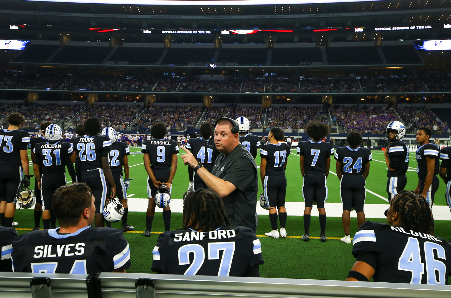 Paetow players on the sideline during the Class 5A-Division I state football championship game between Paetow and College Station on December 17, 2021 in Arlington, Texas.