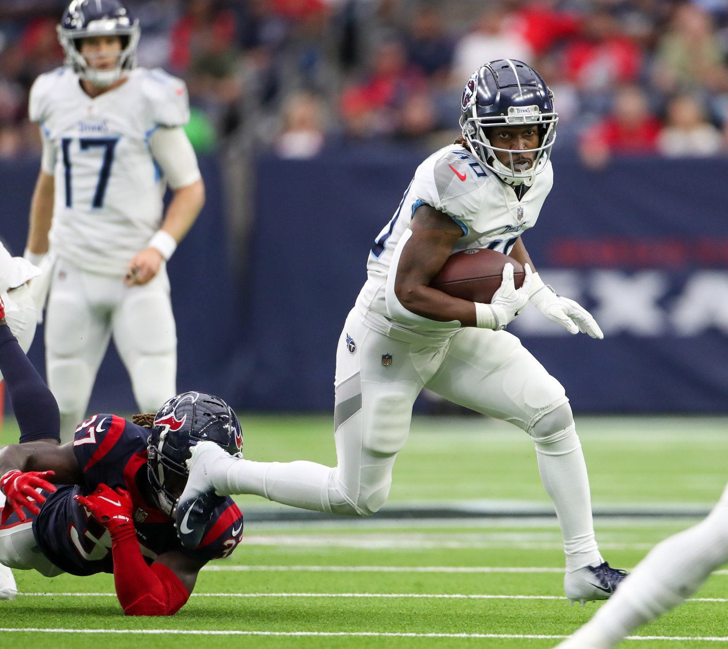 Tennessee Titans running back Dontrell Hilliard (40) carries the ball during an NFL game between the Texans and the Titans on Jan. 9, 2022 in Houston, Texas.