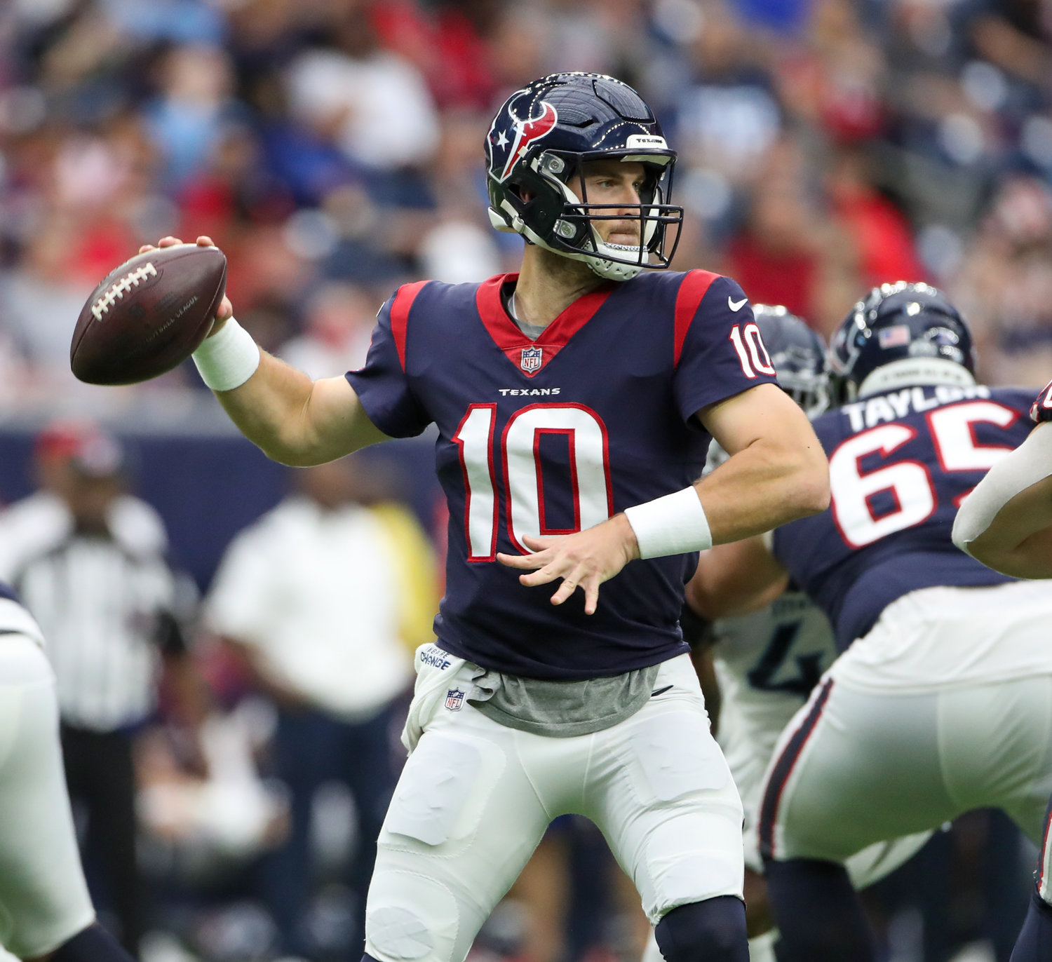 Houston Texans quarterback Davis Mills (10) looks to pass during an NFL game between the Texans and the Titans on Jan. 9, 2022 in Houston, Texas.