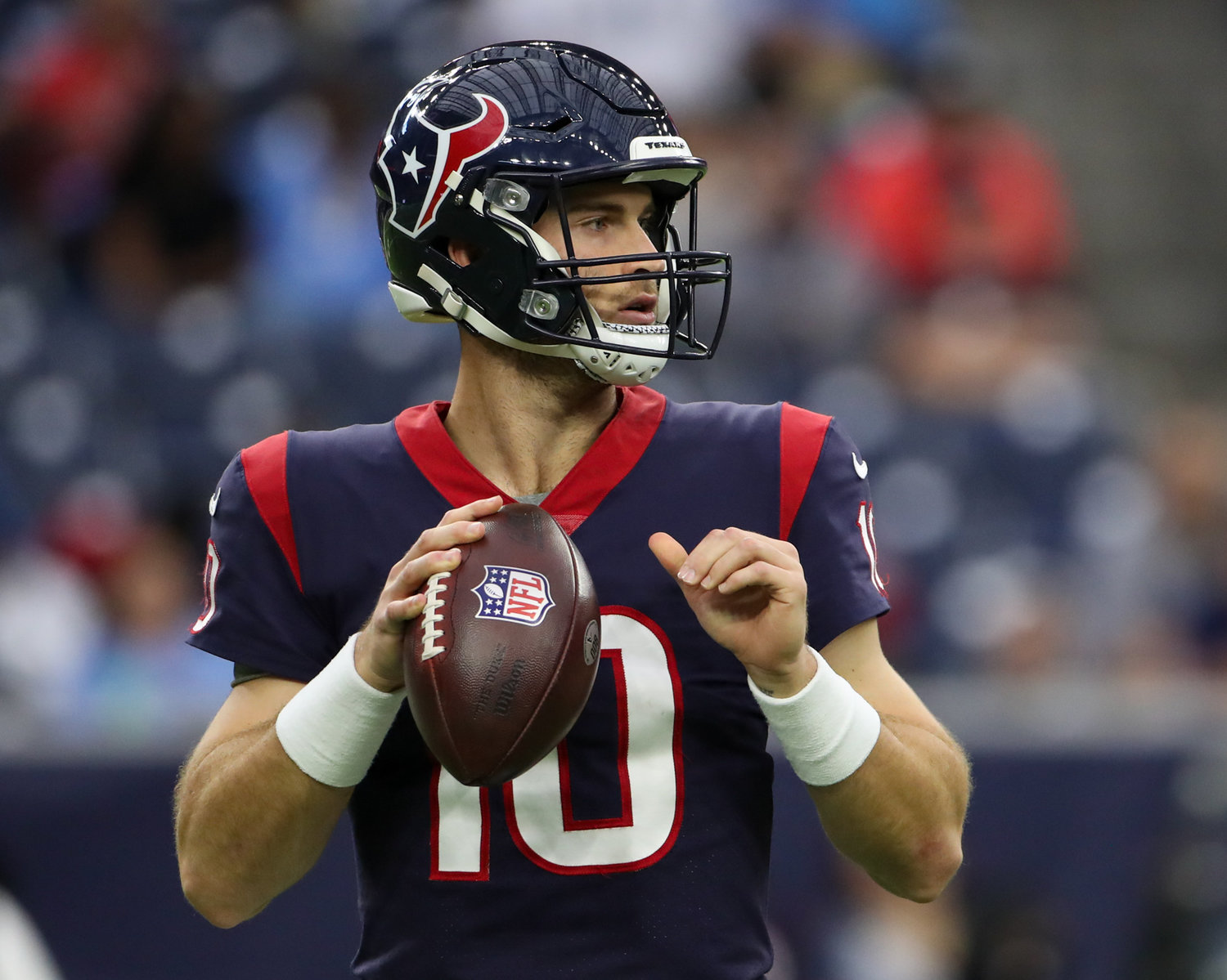 Houston Texans quarterback Davis Mills (10) looks to pass during an NFL game between the Texans and the Titans on Jan. 9, 2022 in Houston, Texas. The Titans won, 28-25.