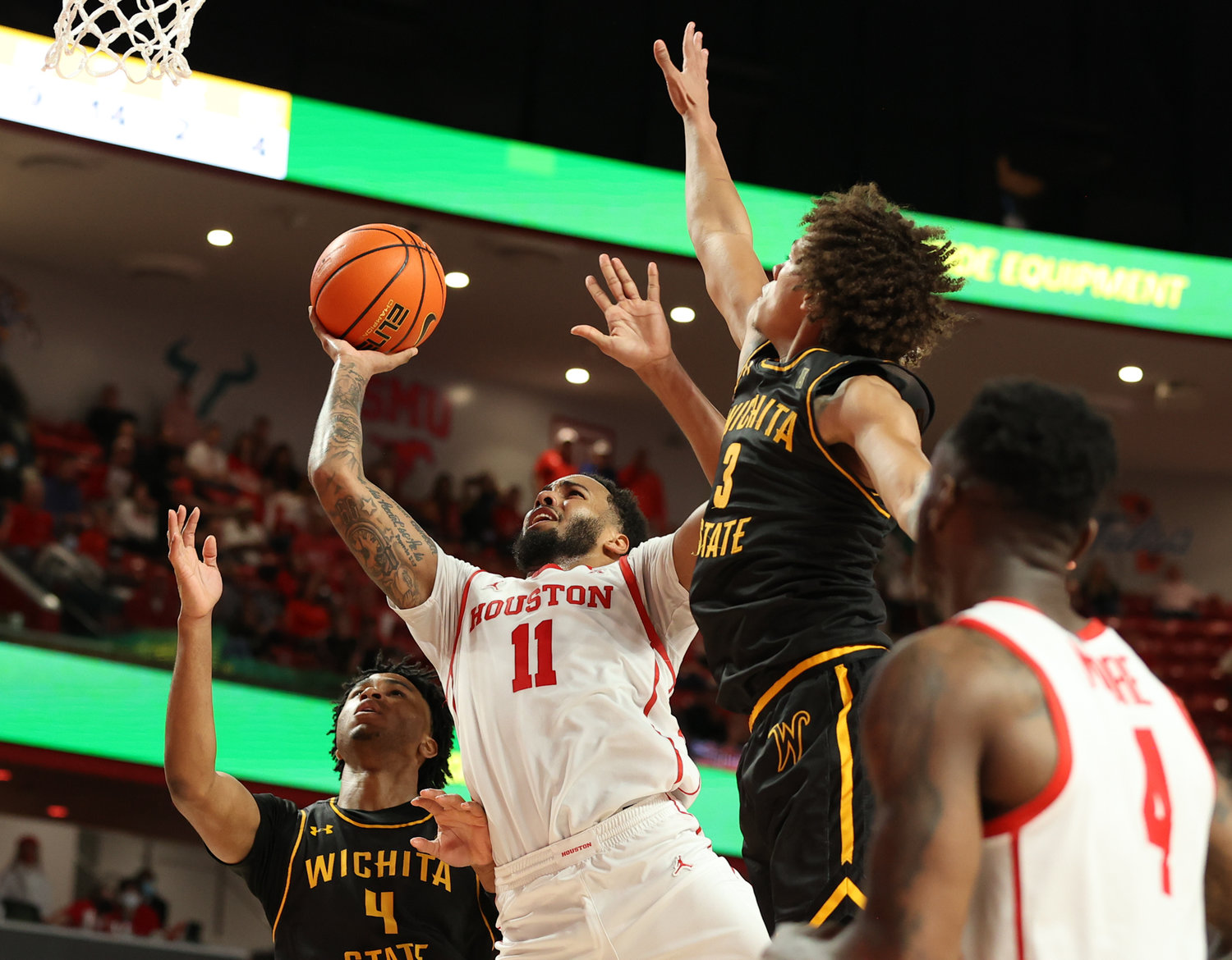 Houston Cougars guard Kyler Edwards (11) goes to the basket during an NCAA men’s basketball game between Houston and Wichita State on Jan. 8, 2022 in Houston, Texas.