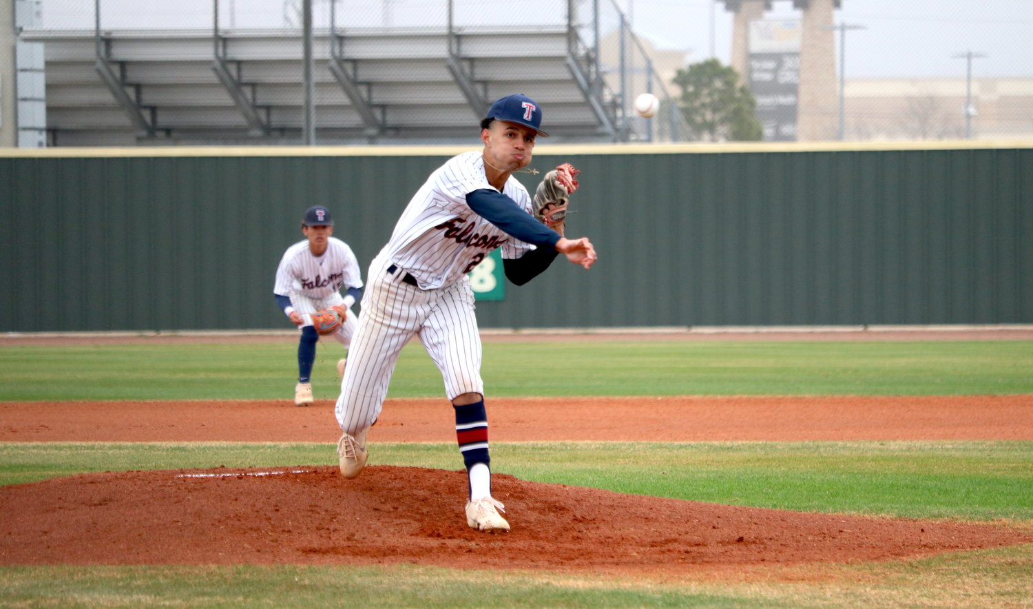 Trevor Esparza pitches during a game between Tompkins and San Antonio Reagan at the Tompkins baseball field.