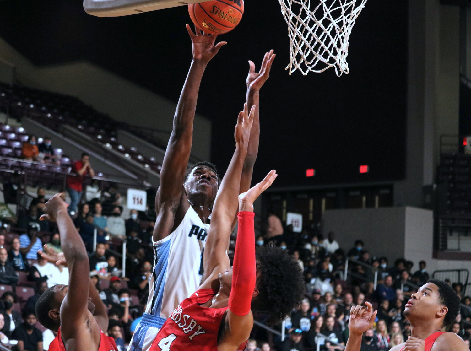 Abou Camara shoots a layup during Friday’s Class 6A Regional Semifinal between Paetow and Crosby at the Campbell Center.