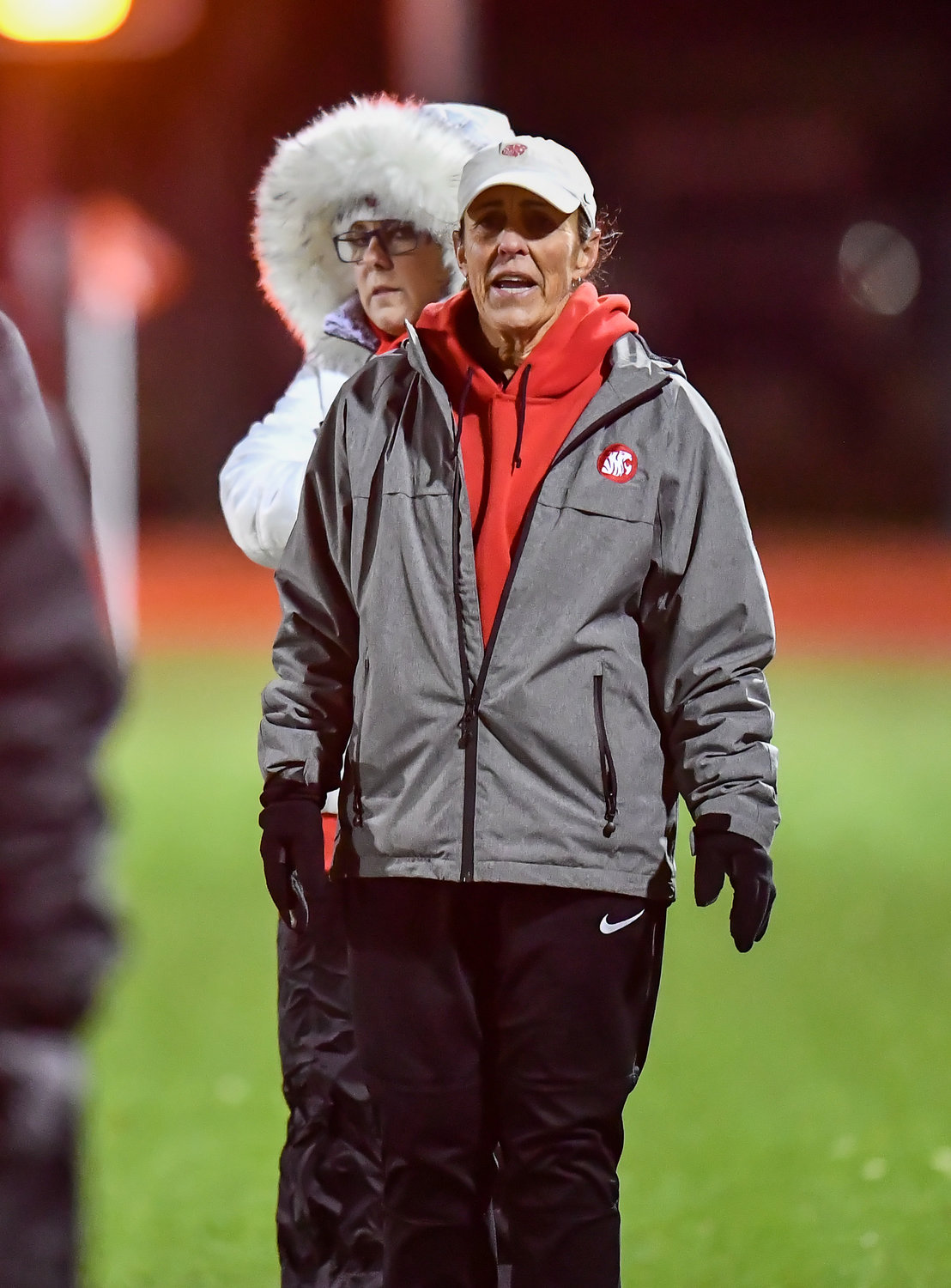 March 8,, 2022: Katy's head coach Dianne Loftin looks on at her lady Tigers during their soccer match against Katy Taylor. (Photo by Mark Goodman / Katy Times)