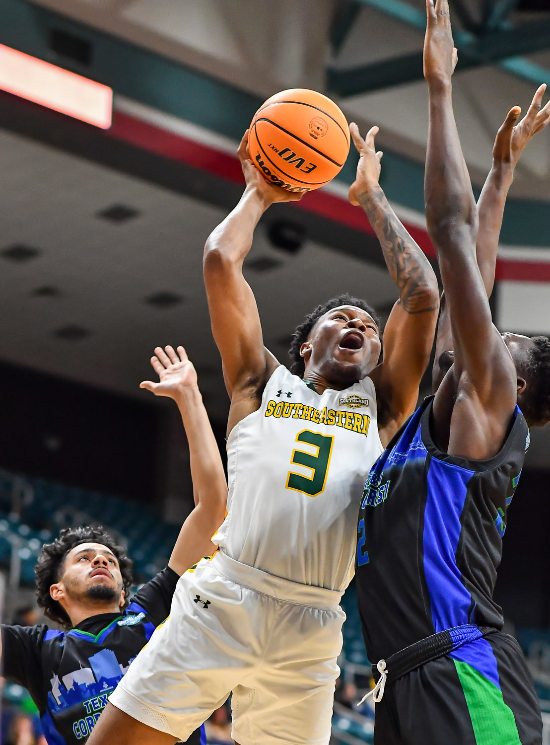 March 12,, 2022:  Southeastern Louisianas Roger McFarlane #3 drives up to the basket during the Southland Conference Basketball Championship game between A&M Corpus Christi vs Southeastern Louisiana. (Photo by Mark Goodman / Katy Times)