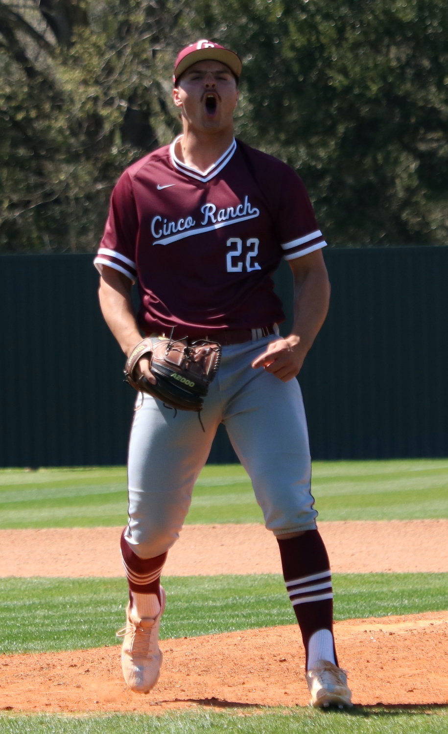 Blake Hansen celebrates after getting out of a jam during Friday’s game between Katy and Cinco Ranch at the Katy baseball field.