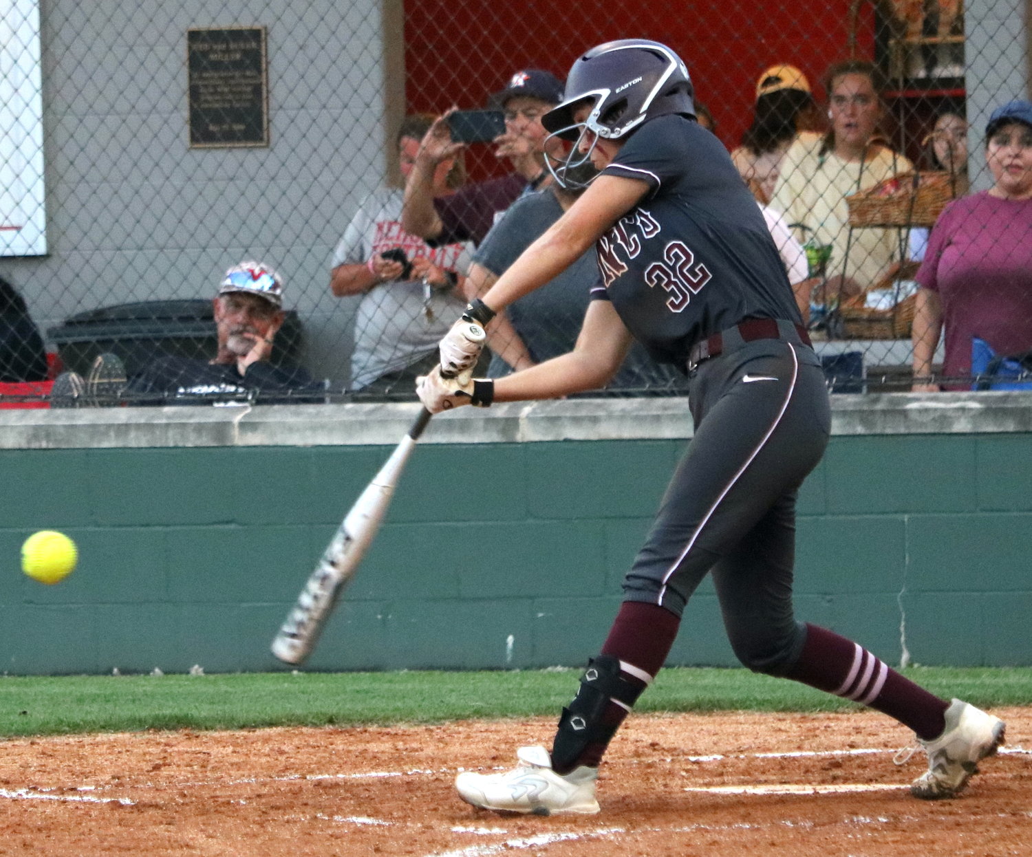 Krista Burg hits during an area round game between Cinco Ranch and Heights at Memorial High School.