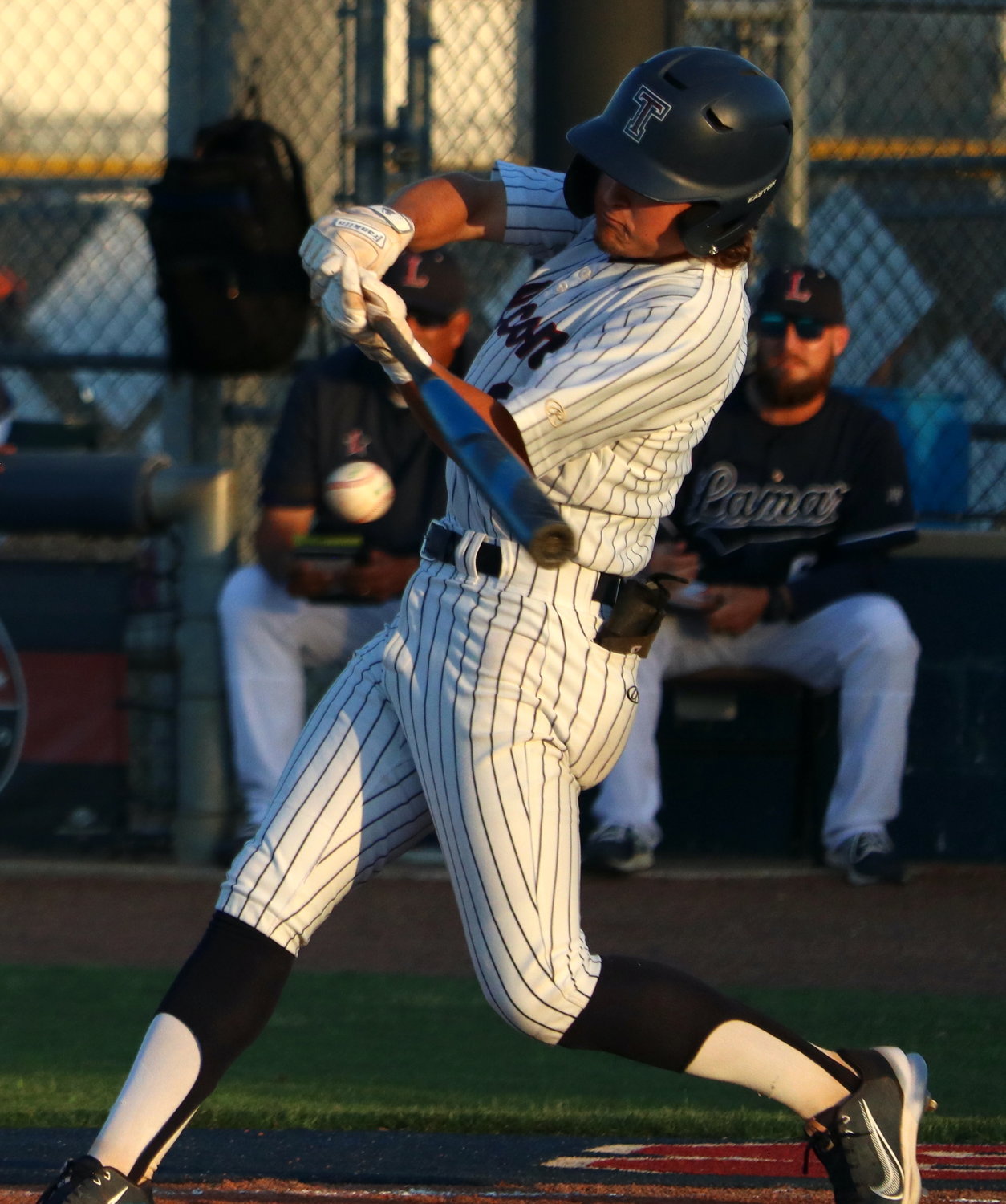 Ty Dagley hits during Thursday’s Class 6A area round game between Tompkins and Lamar at the Tompkins baseball field.