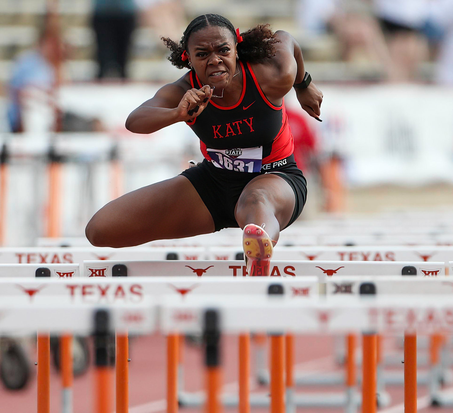 Kaycee McCoy of Katy High School runs in the Class 6A girls 100-meter hurdles at the UIL State Track and Field Meet on May 14, 2022 in Austin, Texas.
