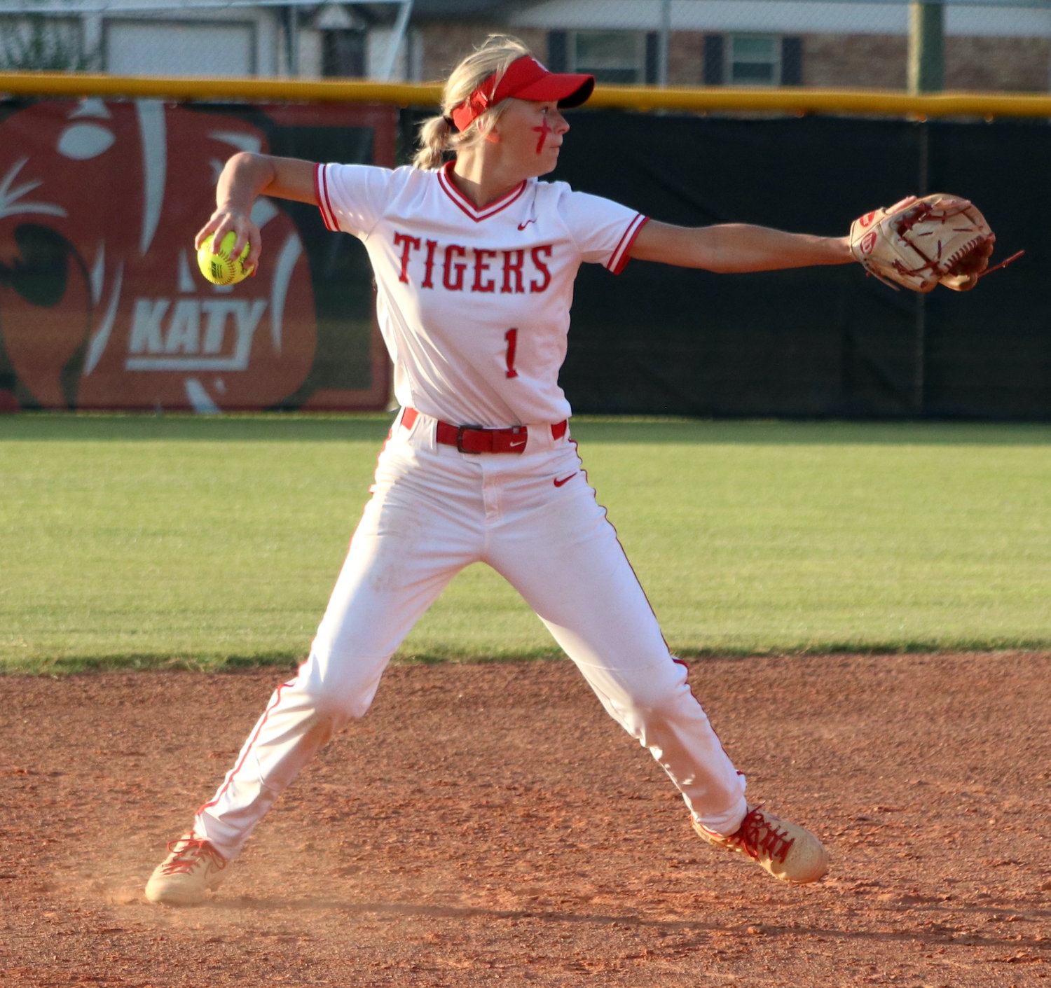 Peyton Watson throws the ball to first base during Wednesday’s Class 6A Regional Semifinal game between Katy and Pearland at the Katy softball field.