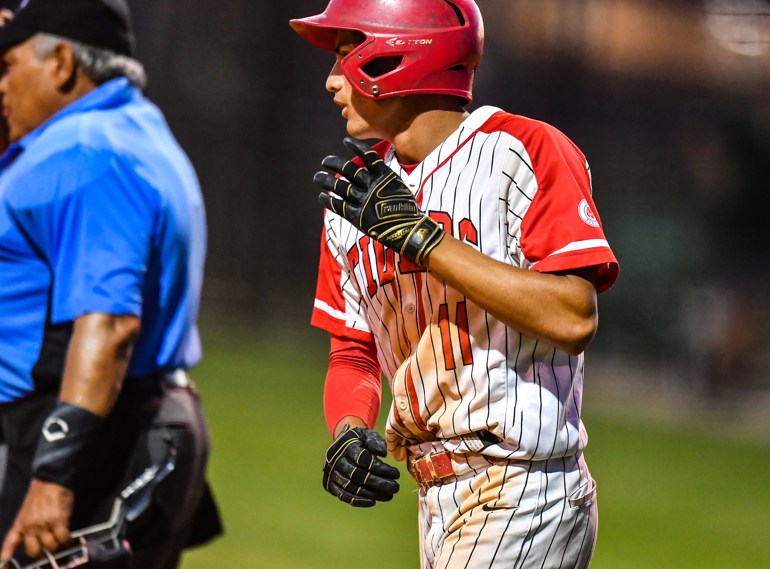 Katy's Dominic Melchor (11) crosses home after a hit by Katy's Graham Laxton (1) scoring during the fourth inning during a Region III-6A SemiFinals baseball game between Katy and Strake Jesuit at Mayde Creek High School, Friday, May 27, 2022.