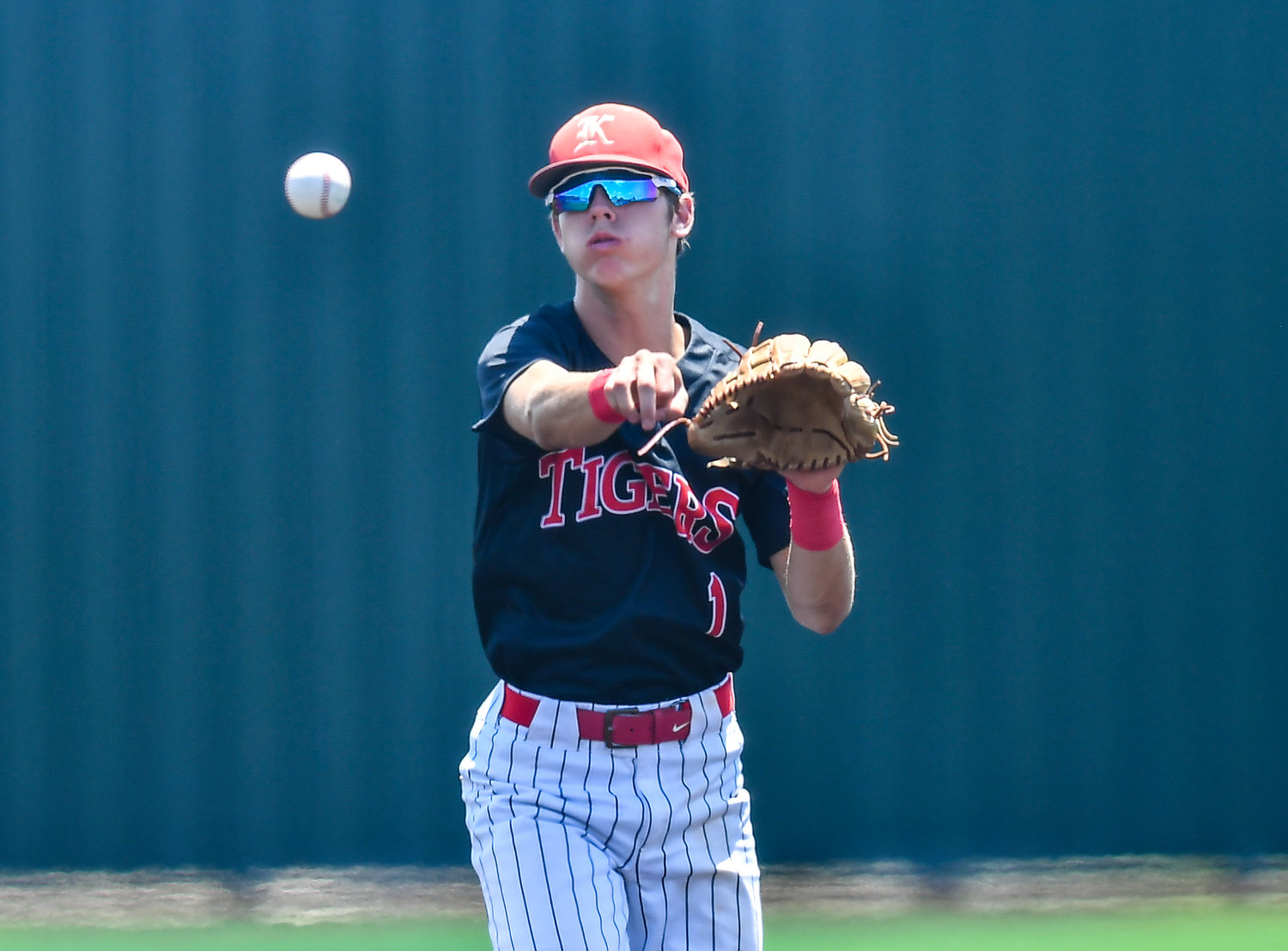 Katy's Graham Laxton (1) makes the throw to first for the out during the fourth inning of game 3 during a Region III-6A Regional SemiFinals baseball game between Katy and Strake Jesuit at Jersey Village High School, Saturday, May 28, 2022.