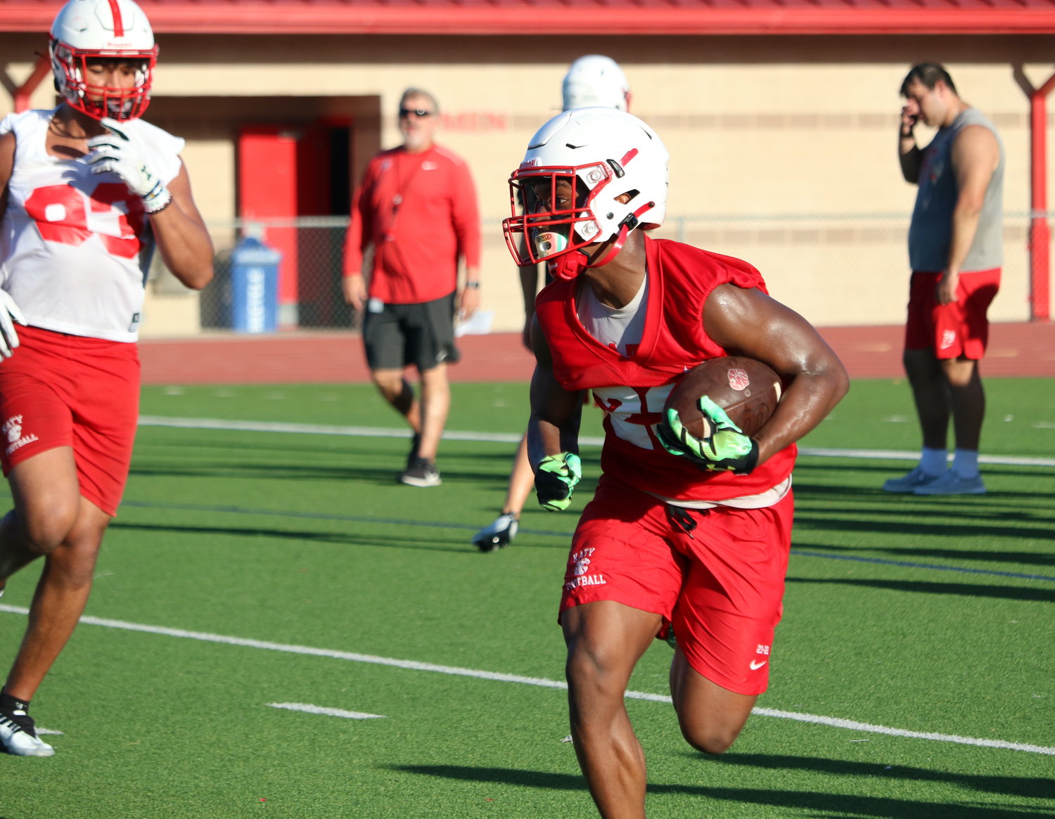 Katy running back Seth Davis carries the ball during Monday’s practice.