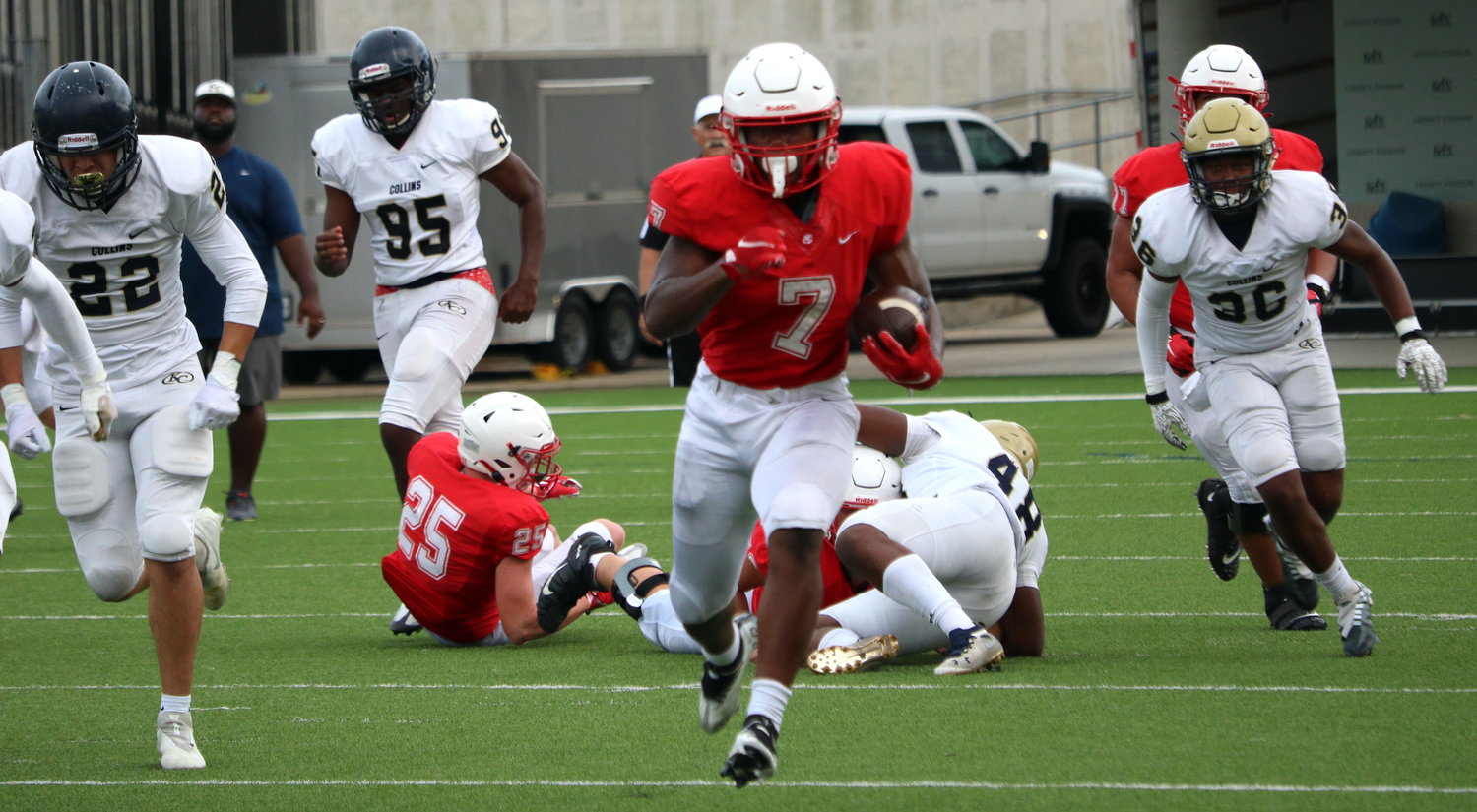 Katy’s Ramarian Tillman breaks free on a run during Katy’s scrimmage against Klein Collins on Friday at Legacy Stadium.
