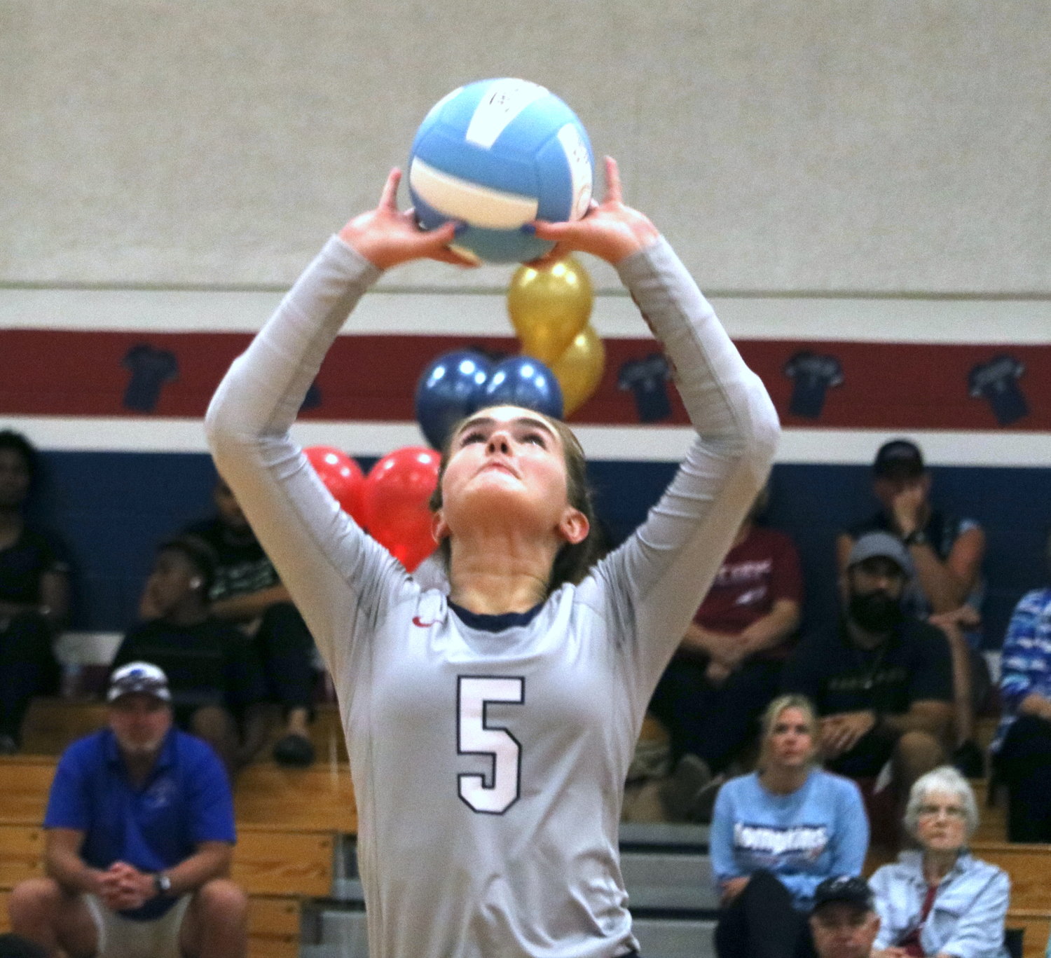 Tompkins’ Brooklyn Merrell sets a ball during Tuesday’s match between Tompkins and Katy at the Tompkins gym.