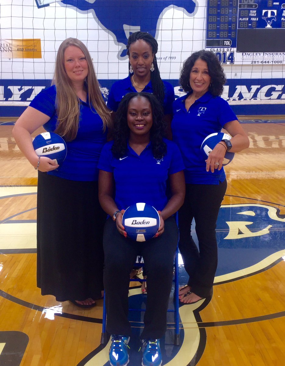 Louise Crite and the Taylor volleyball staff.