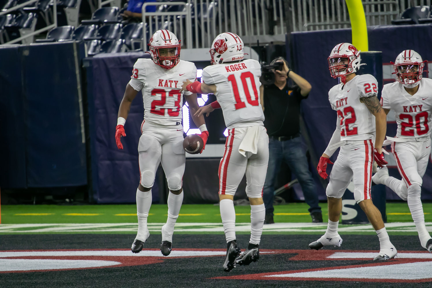 Caleb Koger and Seth Davis celebrate after a touchown during Friday's Class 6A-Division II Region III Final between Katy and C.E. King at NRG Stadium.