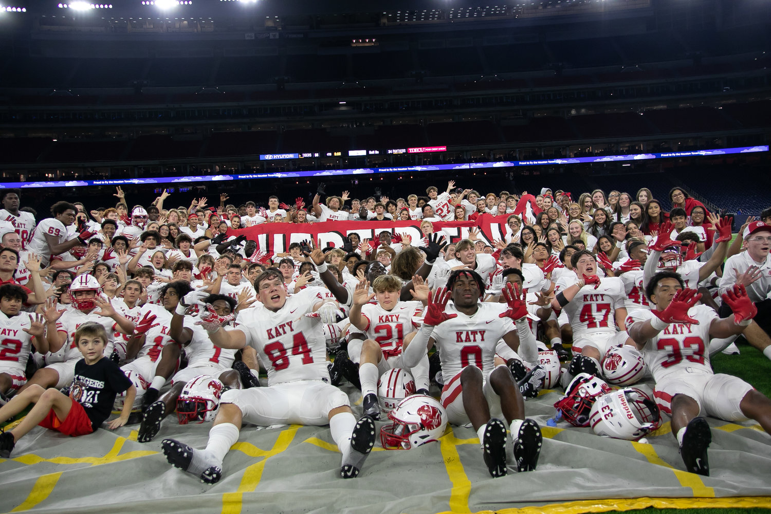 Katy players pose for a photo after Friday's Class 6A-Division II Region III Final between Katy and C.E. King at NRG Stadium.