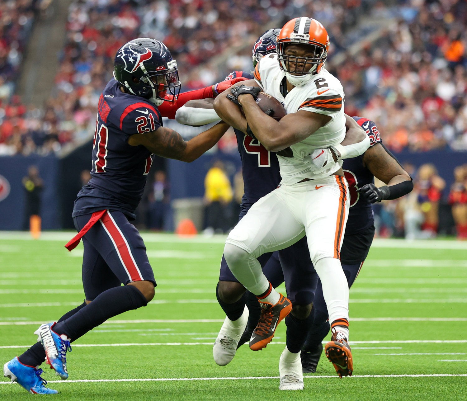 Cleveland Browns wide receiver Amari Cooper (2) is tackled after a catch during an NFL game between the Houston Texans and the Cleveland Browns on Dec. 4, 2022, in Houston. The Browns won, 27-14.