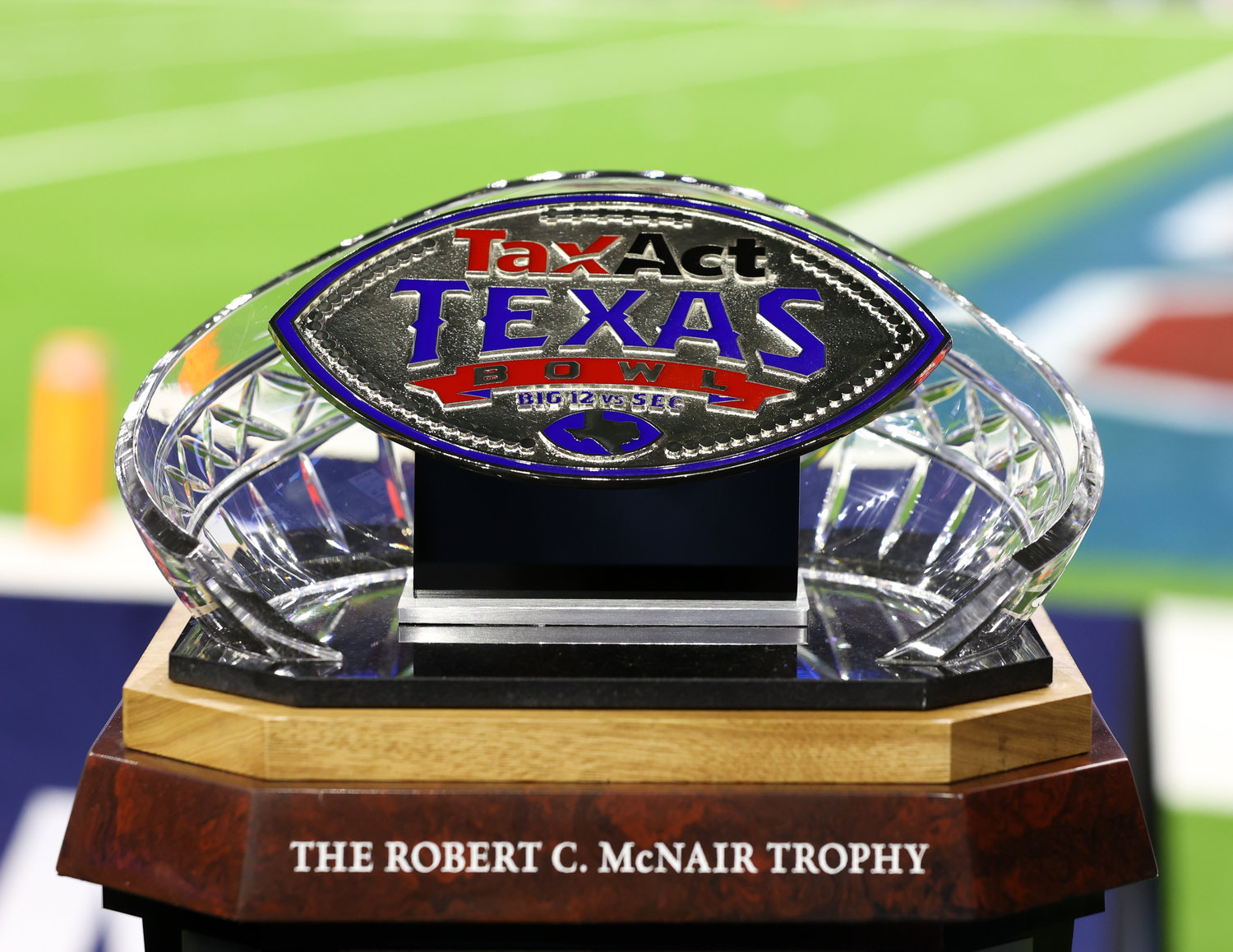 The TaxAct Texas Bowl trophy, on the sidelines during a bowl game between Texas Tech and Ole Miss on Dec. 28, 2022 in Houston. Texas Tech won, 42-25.
