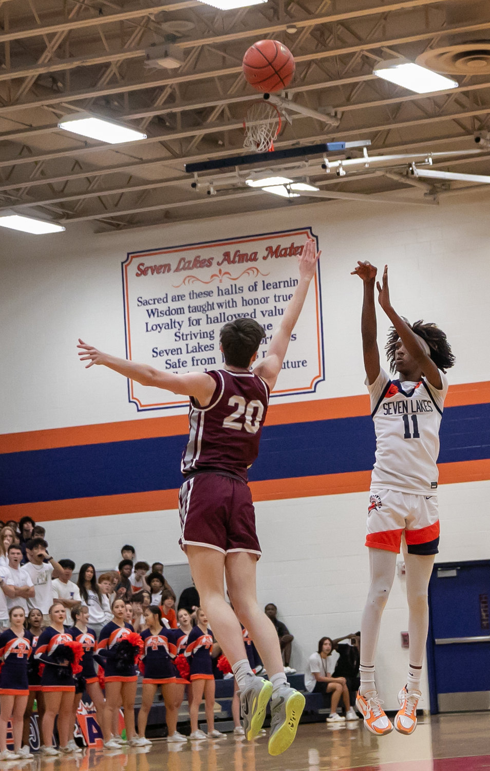 Nasir Price shoots a 3-pointer during Saturday's game between Seven Lakes and Cinco Ranch at the Seven Lakes gym.